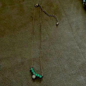 Gold tone and green beaded necklace